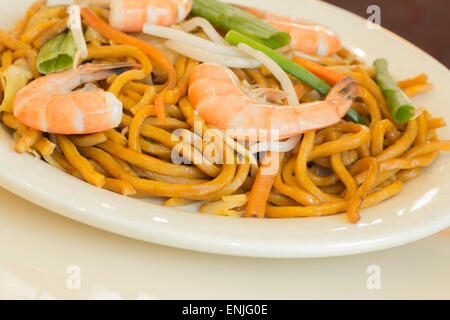 Authentic Chinese Shrimp lo mein noodles at a restaurant Stock Photo