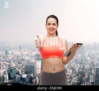 sporty woman with tablet pc computer Stock Photo