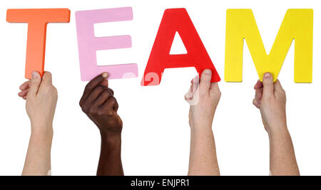 Multi ethnic group of people holding the word Team isolated Stock Photo