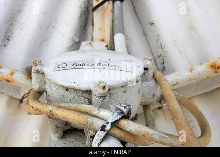 Safety Switch sticker on an old electric box Stock Photo