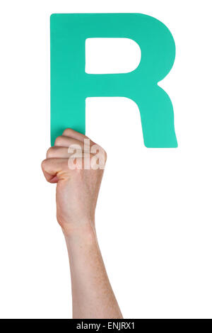 Hand holding letter R from alphabet isolated on a white background Stock Photo