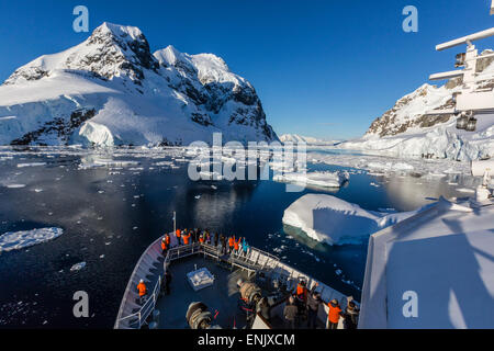 The Lindblad Expeditions ship National Geographic Explorer in the Lemaire Channel, Antarctica, Polar Regions Stock Photo