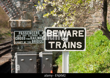 Beware of trains railway warning notice at Carrog station on the Llangollen railway in North Wales Stock Photo