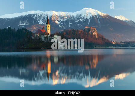 The Assumption of Mary Pilgrimage Church on Lake Bled and Bled Castle, Bled, Slovenia, Europe Stock Photo