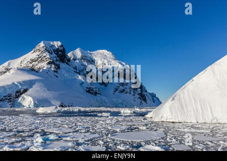 Ice floes choke the waters of the Lemaire Channel, Antarctica, Polar Regions Stock Photo