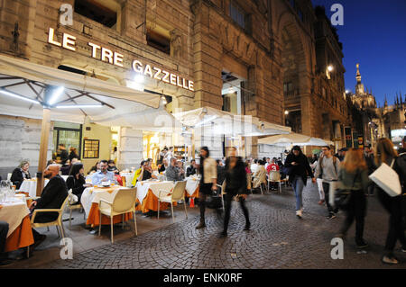 Italy, Lombardy, Milan, Corso Vittorio Emanuele, people at cafe Stock Photo