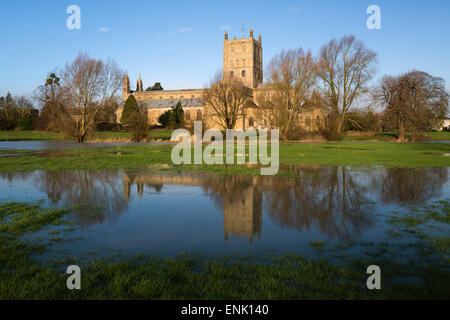 Tewkesbury Abbey reflected in flooded meadow, Tewkesbury, Gloucestershire, England, United Kingdom, Europe Stock Photo