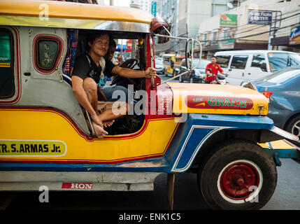 Jeepney traffic in central Manila, Philippines, Southeast Asia, Asia Stock Photo