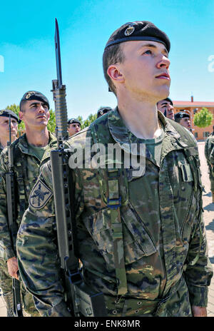 Spanish soldier from the Brigada Paracaidista stands at attention during a retirement ceremony following Operation Skyfall May 6, 2015 in Madrid, Spain. Stock Photo