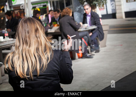 Woman smoking Stock Photo