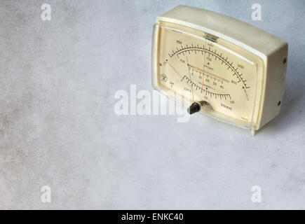 Combined household aneroid barometer hygrometer thermometer device on grunge background Stock Photo