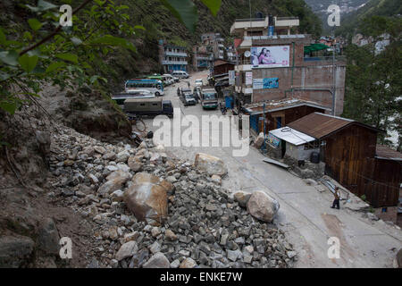 Kobani, Kobani, Nepal. 5th May, 2015. View from the Kobani Village as we can see the landslide caused by the earthquake.Isolated Nepalese Villagers still waiting for help and worry about an other earthquake happen.Most of the houses from ''Dolalgat'' to ''Kobani'' (around 65km) collapsed, destroyed by huge stones fell from the mountains, (and stones are still falling as now), around 5 or 6 earthquakes are felt every day and night, and people didn't get any help from anyone, the phone network doesn't work, they got enough food for only 2 more weeks and can't earn money, they trying to survive Stock Photo