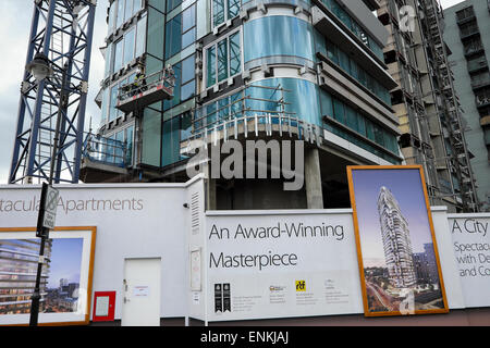 Award-Winning Masterpiece  hoardings and signs outside the Canaletto construction site at City Road Basin in Islington East London, England UK  KATHY DEWITT Stock Photo