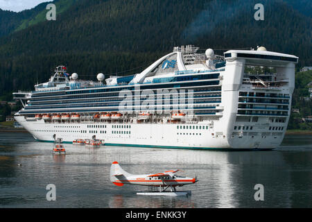 Star Princess docked at the South Franklin dock, Juneau, Alaska. Sightseeing seaplanes parked at the water front in Juneau dock Stock Photo