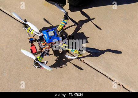 A home built DIY quad copter drone, resting on concrete. USA. Stock Photo