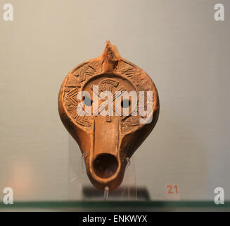 Early Christian. Roman oil lamp. Adorned with Chi Rho symbol. 4th-6th century AD. Vatican Museums. Vatican city. Stock Photo