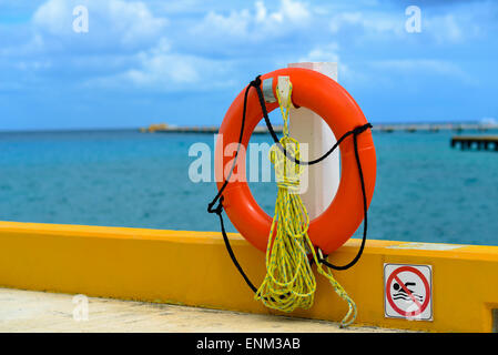 Lifebuoy hanging on a ship Stock Photo