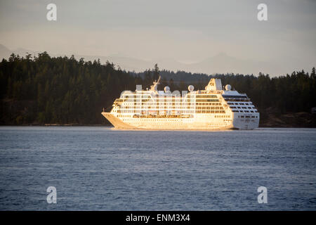 Pacific Princess cruise ship sailing the Inside Passage between Vancouver Island and Quadra Island, British Columbia, Canada Stock Photo