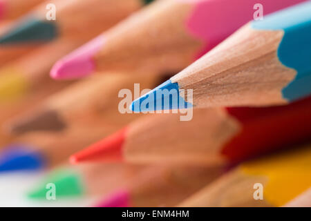 A row of colored pencils stacked on each other Stock Photo