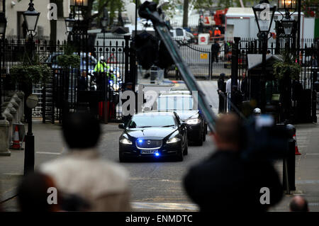 London, UK. 8th May, 2015. British Prime Minister and leader of the Conservative Party David Cameron returns to No. 10 Downing Street by car in London May 8, 2015. The Conservative Party remained the largest party at the House of Commons after the general election held on Thursday. Stock Photo