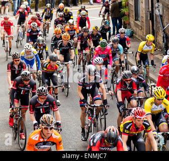 Riders in the Tour de Yorkshire on the Keighley Road Hebden Bridge Yorkshire Stock Photo