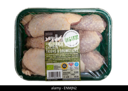 Marks and Spencer free range organic chicken thighs and drumsticks. Stock Photo