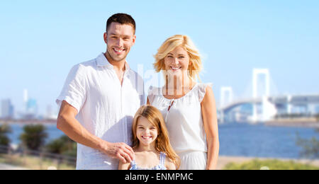 happy family over rainbow bridge background Stock Photo