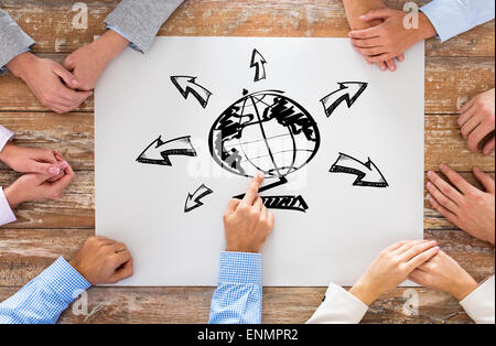close up of business team with globe drawing Stock Photo