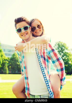 smiling couple having fun in park Stock Photo