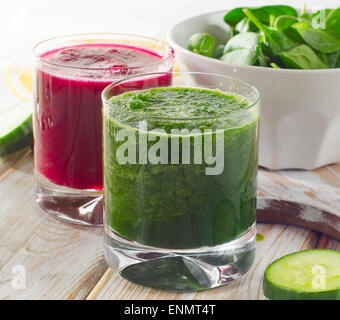 Freshly Squeezed Vegetable Juices on  wooden background. Stock Photo