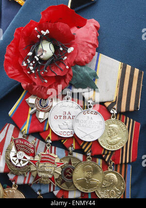 Kiev, Ukraine. 8th May, 2015. Medals on chest of a WWII veteran after the solemn session of Parliament in Kiev, Ukraine, 08 May 2015. Ukraine marks on 08 May the Day of Remembrance and Reconciliation to commemorate all victims of the Second World War. On 09 May Ukraine will mark the 70th anniversary of Victory over Nazism in Europe and Day of Victory. © Serg Glovny/ZUMA Wire/ZUMAPRESS.com/Alamy Live News Stock Photo