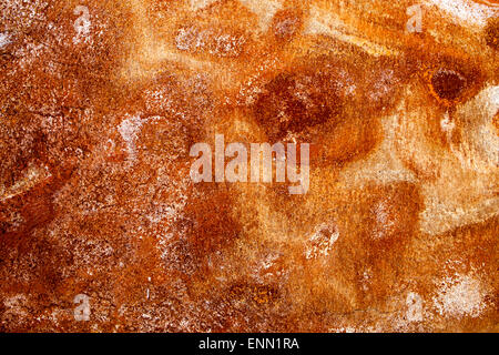 closeup of a yellow and brown rusty surface Stock Photo