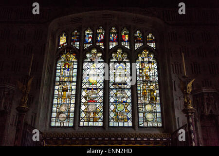 UK, England, Ewelme.  St. Mary the Virgin Church.  Window, Fragments of Medieval Stained Glass, above Altar of St. John Baptist. Stock Photo
