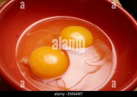 bowl with raw egg Stock Photo