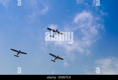 Group of old piston planes flying in formation at an air show in Vrsac, Serbia. Stock Photo
