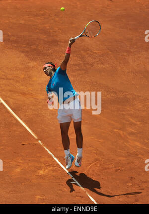 Madrid, Spain. 8th May, 2015. Rafael Nadal of Spain serves during the men's singles quarterfinal against Grigor Dimitrov of Bulgaria at the Madrid Open tennis tournament in Madrid, Spain, May 8, 2015. Rafael Nadal won 2-0. Credit:  Xie Haining/Xinhua/Alamy Live News Stock Photo