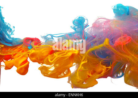 Clouds of bright colorful ink mixing in water Stock Photo