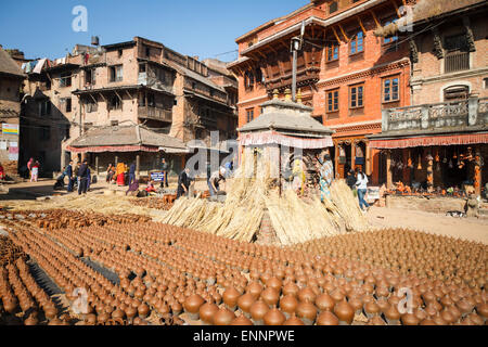 Clay pots drying in Potter's square in Bhaktapur, Nepal Stock Photo