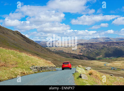 Car on Honister Pass (B5289), Lake District National Park, Cumbria, England UK Stock Photo