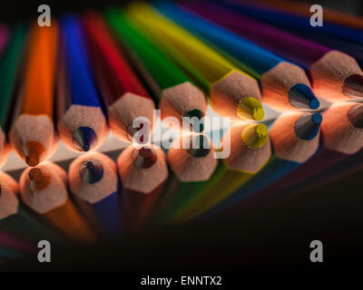 group of color wooden pencils on black background with reflection Stock Photo
