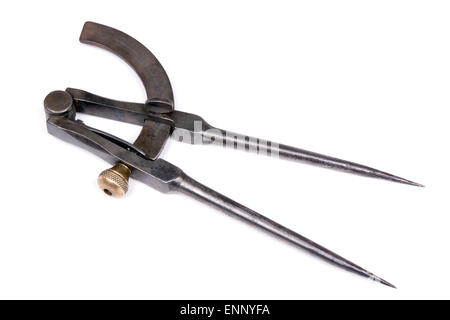 Old metal compass on the white background. Stock Photo