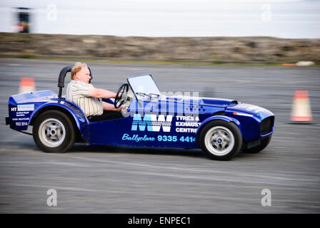 A man drives a kit car around a time-trial course at speed Stock Photo