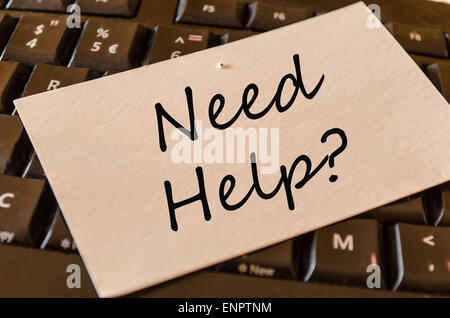 Need help Concept on black keyboard note Stock Photo