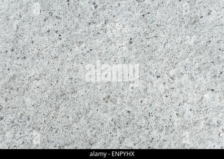 Light Grey Concrete Floor with Small Black Dot Pattern Stock Photo