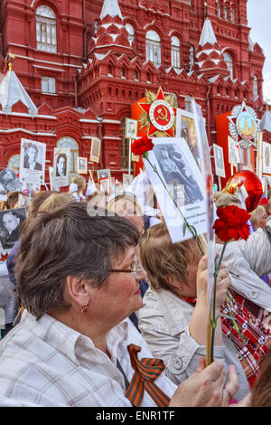 Red Square, Moscow, Russia - MAY 9: parade of immortal regiment, the memory of soldiers in Great Patriotic War ( World War II ). Stock Photo