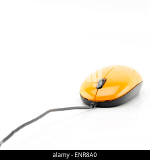 orange computer mouse isolated on white background Stock Photo