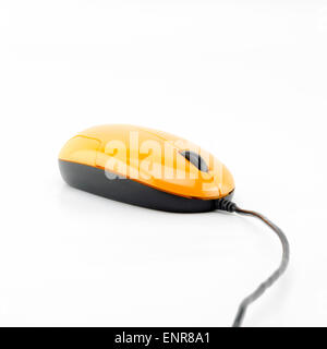 orange computer mouse isolated on white background Stock Photo