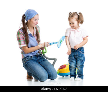 Little girl and her mother cleaning floor at home Stock Photo - Alamy