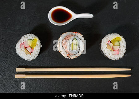 sushi pieces with soy sauce and chopsticks Stock Photo