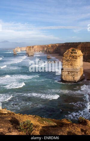 The Twelve Apostles is a collection of limestone stacks off the shore of the Port Campbell National Park, by the Great Ocean Road in Victoria Stock Photo